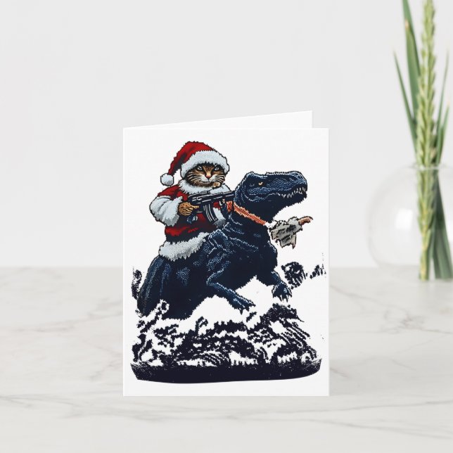 Christmas Cat In Santa Hat Holding A Gun And Dinos Card (Front)