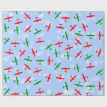 Christmas Cessnas flying through snowflakes