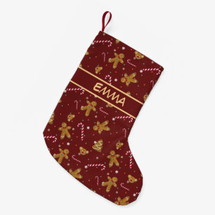 Christmas cookies and gingerbread men on maroon. small christmas stocking