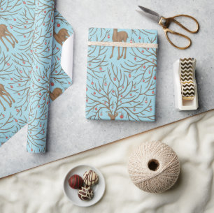 Christmas deer on blue wrapping paper