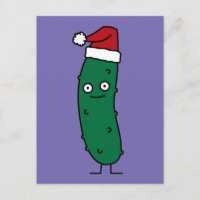 Christmas Dill Pickle wearing a Santa Hat
