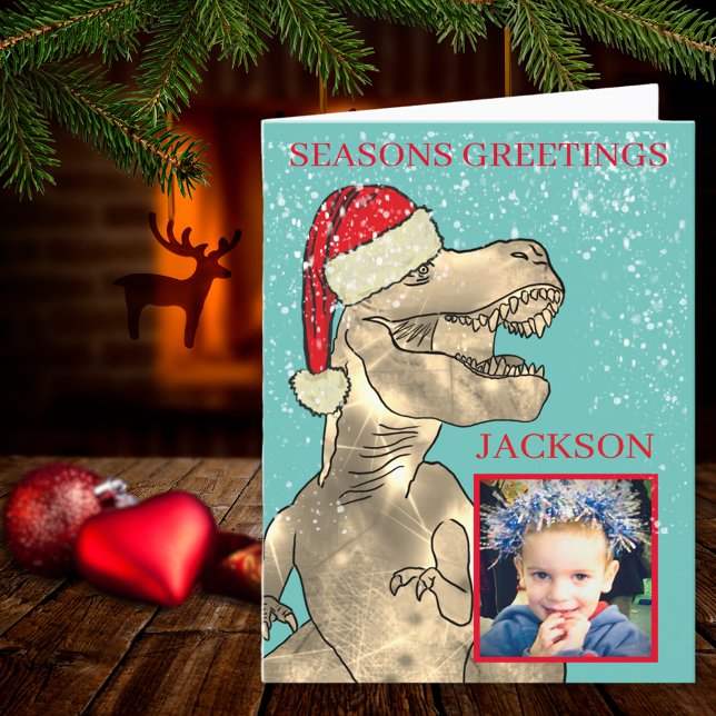 Christmas Dinosaur T-Rex add Photo Holiday Card (Christmas dinosaur T-Rex wearing a Santa hat seasons greetings photo template holiday folded card)
