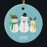 Christmas Face Mask Snowman Family 2020 Ceramic Tree Decoration<br><div class="desc">This design was created though digital art. It may be personalised in the area provided or customising by changing the photo or added your own words. Contact me at colorflowcreations@gmail.com if you with to have this design on another product. Purchase my original abstract acrylic painting for sale at www.etsy.com/shop/colorflowart. See...</div>