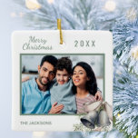 Christmas family photo white green bells ceramic ornament<br><div class="desc">Personalise and add your own family photo. A green frame decorated with classic Christmas bells decor.   Add your family name and year.</div>