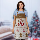 Christmas Gingerbread Man & Candy Cane Apron<br><div class="desc">A Christmas apron with candy canes and gingerbread men for those who love to bake or spend time in the kitchen preparing a good meal for Xmas. It comes with two customisable texts,  if you want to offer it,  or just get it for you!</div>