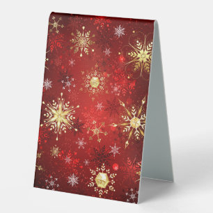 Christmas Golden Snowflakes on Red Background