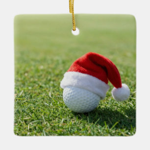 Christmas Golf Ball with Santa Hat on Tee on Green Ceramic Ornament