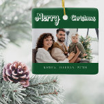 Christmas green family photo names modern ceramic ornament<br><div class="desc">White text: Merry Christmas,  written with a trendy style script. Personalise and use your own photo and names. A classic green background.</div>