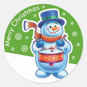 Christmas green round sticker Snowman drummer.
