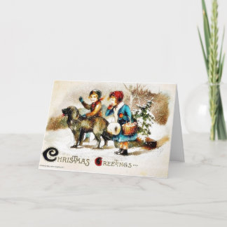 Christmas greeting with a boy and a girl going wit holiday card