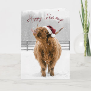 Christmas Highland Cow Licking Snowflakes Card