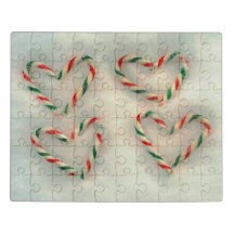 Christmas Holiday Candy Cane Hearts On Real Snow.