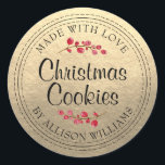 Christmas Homemade Cookies Champagne Gold Jar Classic Round Sticker<br><div class="desc">Rustic and modern homemade Christmas cookies jar sticker with the text made with love, homemade Christmas cookies and your name in modern script on a champagne gold background with a stylish touch of cranberries. Simply add your name and the product name to the label. Exclusively designed for you by Happy...</div>