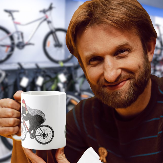 Christmas Honey Badger Cycling on a Bicycle  Coffee Mug (Christmas honey badger wearing a Santa hat riding Bicycle. Funny wild animal badass cyclist art)