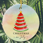Christmas in July Watermelon Ceramic Tree Decoration<br><div class="desc">These fun Christmas in July ornament is decorated with a red watercolor watermelon Christmas tree on a colourful background.
Because we create our artwork you won't find this exact image from other designers.
Original Watercolor © Michele Davies.</div>