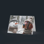 Christmas Irish Setter Dog With a Snowman Card<br><div class="desc">A snowman and an Irish Setter dog dressed in hats and scarves stand side by side in a snowy forest for Christmas.</div>