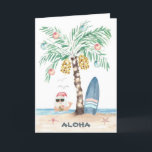 Christmas Island Surf Santa Palm Tree Beach Holiday Card<br><div class="desc">Surf theme Christmas card features a palm tree (decorated with ornaments and string lights) on a tropical island with a surfboard, starfish, sea birds and Santa swimming in the ocean giving the Aloha sign while enjoying a tropical beverage. Both lines of text inside can be personalised. Art by KL Stock...</div>