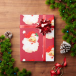 Christmas Jolly Santa Merry Fun  Wrapping Paper<br><div class="desc">A jolly Santa face on a red Christmas background.
Fun and cheery to acknowledge the Christmas season.</div>