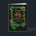 Christmas Joy Across the Miles Holly and Mistletoe Card<br><div class="desc">A stylish Christmas card from far away, with traditional Christmas foliage, holly and mistletoe tied with red bows, ivy and fir sprigs and a fir cone, all on a black background. The front cover greeting in gold coloured decorative lettering is, 'Wishing you Joy at Christmas, ' and 'across the miles!'...</div>
