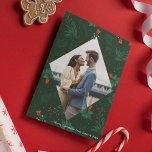 Christmas Kiss Mistletoe Romantic Photo Diamond Holiday Card<br><div class="desc">Christmas kisses and holiday wishes abound with this festive and romantic mistletoe pattern card. Fill the elegant diamond with your favourite couple kiss photo and add your custom Xmas message in white over the botanical green background. A beautiful mistletoe hangs over your kissing photograph.</div>