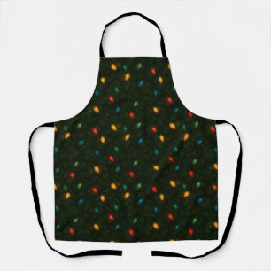 Christmas lights wrapped in holly leaves patterned apron