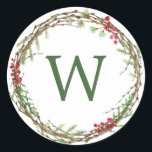 Christmas Monogram Winter Greenery Wreath Berries Classic Round Sticker<br><div class="desc">Rustic monogrammed winter greenery leaves berries wreath Christmas envelope seal or gift sticker. Simply customise the Christmas label by adding your monogram initial. Modern and simple,  red and green Christmas theme. Exclusively designed for you by Happy Dolphin Studio. If you need any help please contact us at happydolphinstudio@outlook.com.</div>