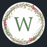 Christmas Monogram Winter Greenery Wreath Berries Classic Round Sticker<br><div class="desc">Rustic monogrammed winter greenery leaves berries wreath Christmas envelope seal or gift sticker. Simply customise the Christmas label by adding your monogram initial. Modern and simple,  red and green Christmas theme. Exclusively designed for you by Happy Dolphin Studio. If you need any help please contact us at happydolphinstudio@outlook.com.</div>