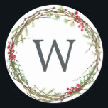 Christmas Monogram Winter Greenery Wreath Berries Classic Round Sticker<br><div class="desc">Rustic monogrammed winter greenery leaves berries wreath Christmas envelope seal or gift sticker. Simply customise the Christmas label by adding your monogram initial. Modern and simple,  red and green Christmas theme. Exclusively designed for you by Happy Dolphin Studio. If you need any help please contact us at happydolphinstudio@outlook.com.</div>