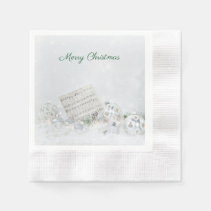 Christmas music and ornaments in snow napkin