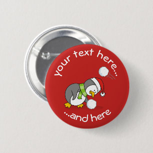 Christmas penguin getting a snow ball 6 cm round badge