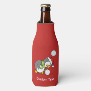 Christmas penguin getting a snow ball bottle cooler