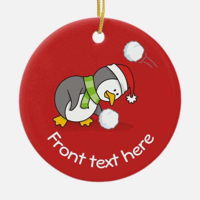 Christmas penguin getting a snow ball ceramic tree decoration (Front)