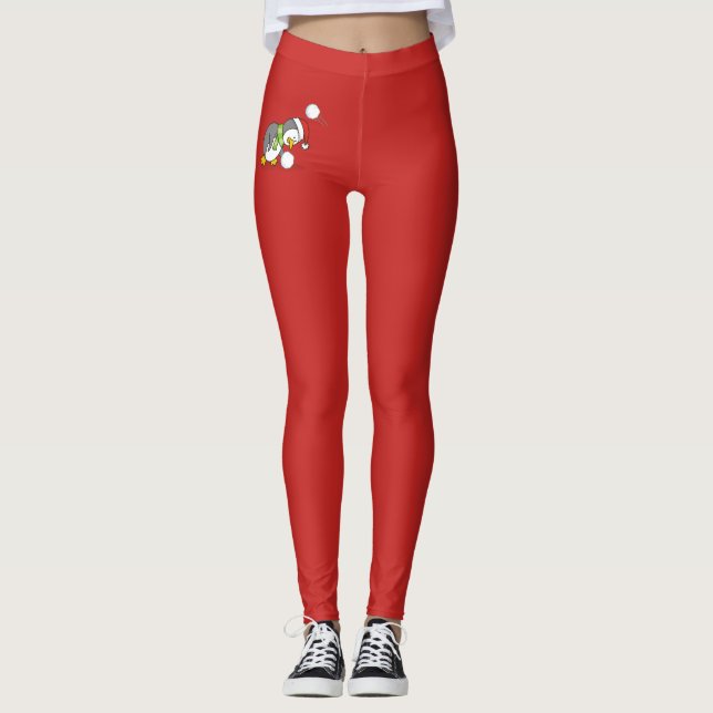 Christmas penguin getting a snow ball leggings (Front)