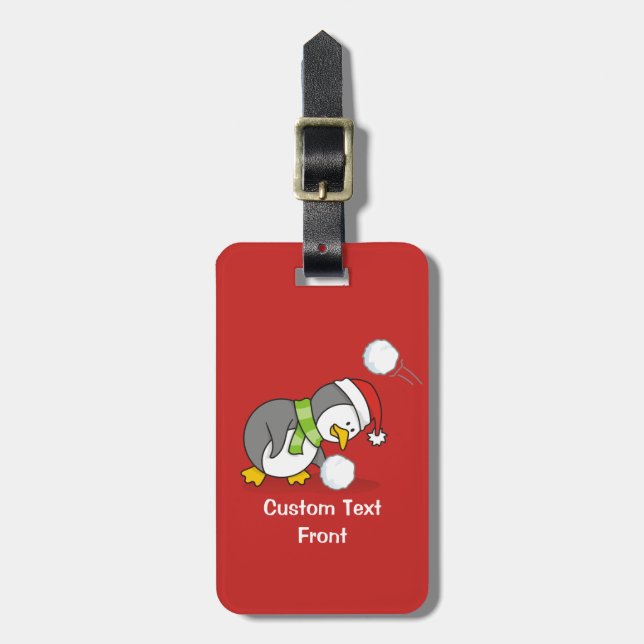 Christmas penguin getting a snow ball luggage tag (Front Vertical)