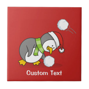 Christmas penguin getting a snow ball tile