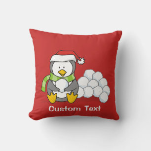 Christmas penguin sitting with snow balls cushion