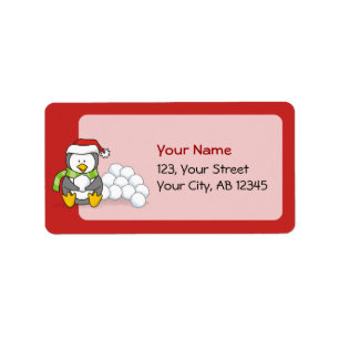 Christmas penguin sitting with snow balls label