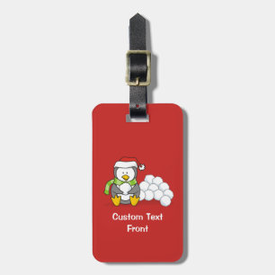 Christmas penguin sitting with snow balls luggage tag