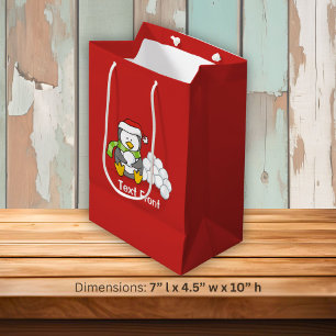 Christmas penguin sitting with snow balls medium gift bag