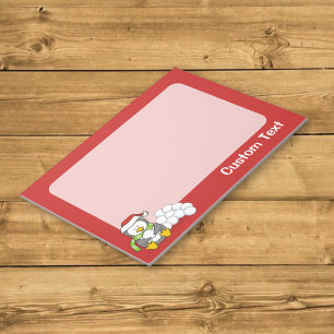 Christmas penguin sitting with snow balls notepad