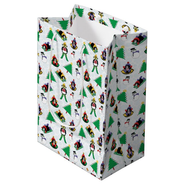 Christmas penguin skiing medium gift bag (Front Angled)