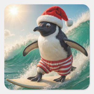 Christmas Penguin Surfing On an Ocean Wave Square Sticker