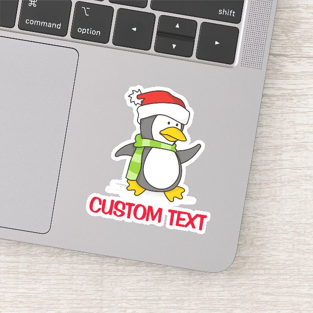 Christmas penguin walking on snow (Detail)