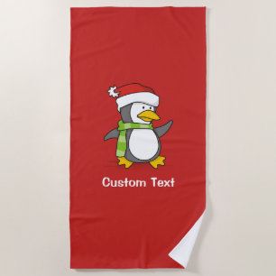 Christmas penguin walking on snow beach towel