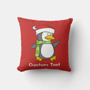 Christmas penguin walking on snow cushion