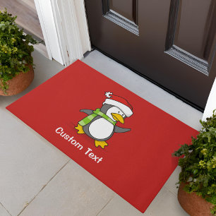 Christmas penguin walking on snow doormat