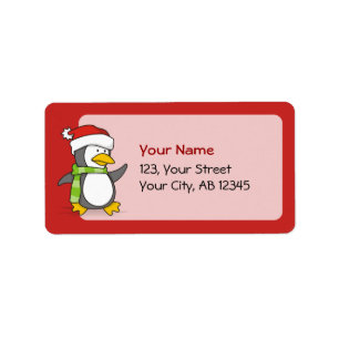 Christmas penguin walking on snow label