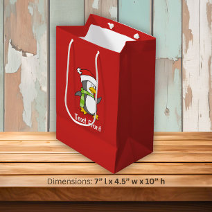 Christmas penguin walking on snow medium gift bag