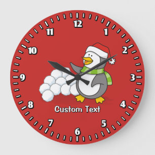 Christmas penguin with snow balls waving large clock