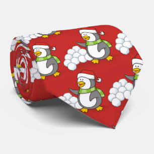 Christmas penguin with snow balls waving tie
